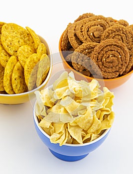 Indian Street Snack Food Besan Papdi With Masala Khari Papdi or Chakli on White Background