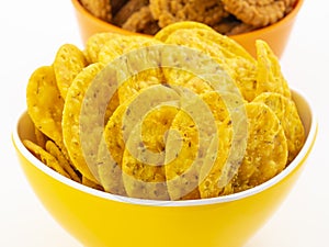 Indian Street Snack Food Masala Khari Papdi with Chakli on White Background