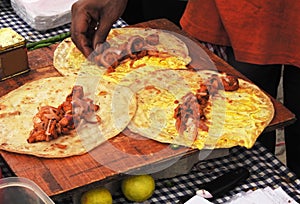 Indian street vendor making vegetarian spring rolls