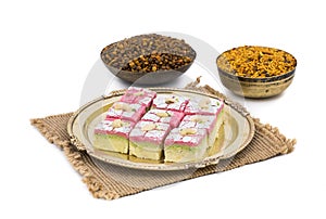 Indian Sweet Food Dryfruit Barfi With Namkeen on White Background