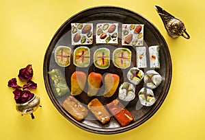 Indian sweets and Mithai on a copper tray