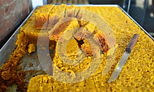 Indian Sweets - mysore pak in a sweet shop photo