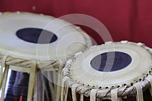 Indian tabla drums on a red background