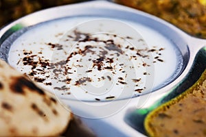 Indian Tali plate with detail of lassi