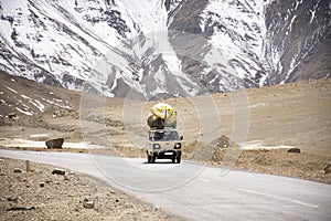 Indian or tibetan driver people driving van on Leh Manali and Srinagar Leh Highway journey go to village at Leh Ladakh while