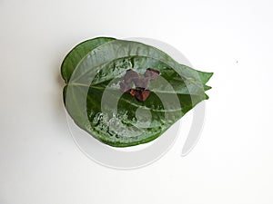 Indian traditional chewing for digestion of betel leaves and betelnut  on white background