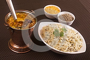 Indian Traditional dal fry and jeera rice also known as dal chawal