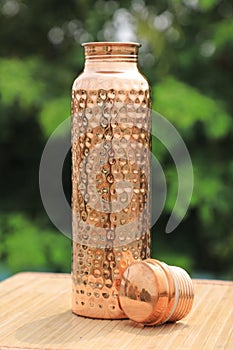 Indian Traditional Hammered Copper Water Bottle for Good Health photo