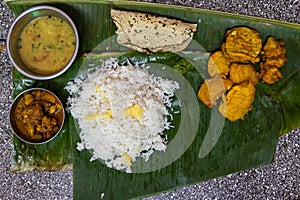 indian traditional launch served at banana leaf at home form top angle