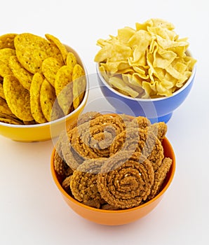 Indian Traditional Snack Chakli With Masala Khari Papdi or Besan Papdi on White Background