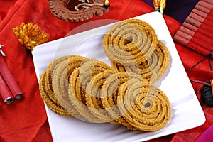 Indian Traditional Snack Chakli, a spiral shaped, Chakali or murukku Indian Traditional Tea Time Snack, Traditional Diwali