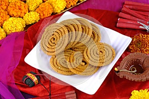 Indian Traditional Snack Chakli, a spiral shaped, Chakali or murukku Indian Traditional Tea Time Snack, Traditional Diwali