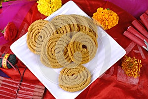 Indian Traditional Snack Chakli, a spiral shaped, Chakali or murukku Indian Traditional Tea Time Snack, Traditional Diwali