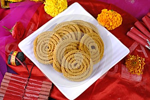 Indian Traditional Snack Chakli, a spiral shaped, Chakali or murukku Indian Traditional Tea Time Snack, Traditional Diwali