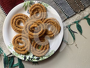 Indian Traditional Tea Time Snack Chakli, a deep fried snack, It is known as Chakali, Murukku, Muruku, Murkoo, Chakri.