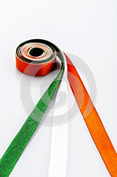 Indian Tricolor or Tiranga with satin ribbon for indian Republic and Independence day concept