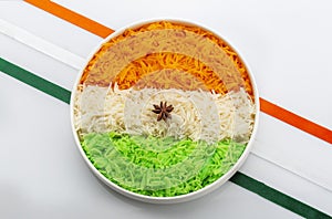 Indian Tricolour or Tiranga Rice for indian Republic and Independence day celebration served in a ceramic plate