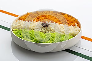 Indian Tricolour or Tiranga Rice for indian Republic and Independence day celebration served in a ceramic plate