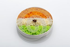 Indian Tricolour or Tiranga Rice for indian Republic and Independence day celebration served in a ceramic plate