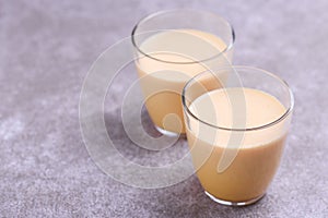 Indian turmeric milk with saffron, cardamom and turmeric. Copyspace
