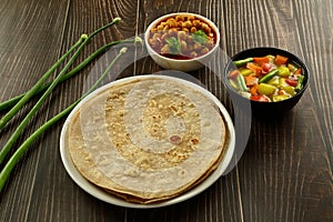 Indian vegan foods- chapatti and curries  top view.