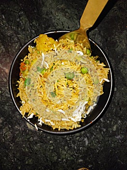 Indian vegetarian dishes, food photography, rice and vegetables in a bowl, dinner recipes, biryani background, fried rice in a pan