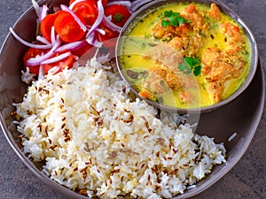 Indian vegetarian meal - punjabi kadi and rice photo