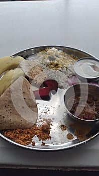Indian vej dish, rice bread photo