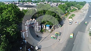 Indian Village drone views, this village is connected with city roads and this is village drone footage with roads and vehicles.