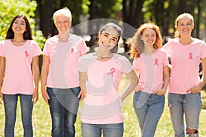 Indian Volunteer Girl Standing With Oncology Support Group In Park