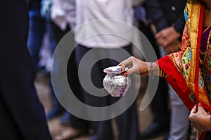 Indian wedding ceremony : bangle in bridal hand with mehandi design