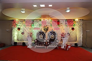 Indian wedding ceremony :stage decoration with lighting and flower