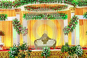 Indian wedding ceremony :stage decoration with lighting and flower