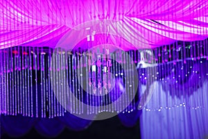 Indian wedding ceremony :stage decoration with lighting and flower