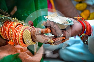 Indian wedding couples holding hands