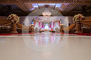 Indian wedding mandap with flowers and decor