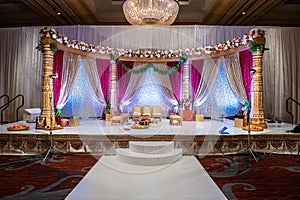 Indian wedding mandap with flowers and decor