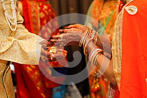 Indian wedding  photography ,groom and bride hands