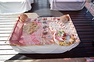 Indian wedding prayer items for thread ceremony, pooja Puja, focused on tray of color power