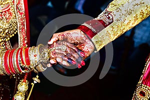 Indian Wedding Rituals; Holding hands;