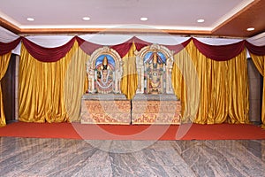 Indian wedding stage decoration with lord Venkateshwara and goddess ambal