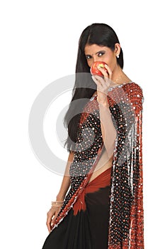 Indian woman with apple