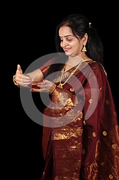 Indian Woman with Diwali Lamp