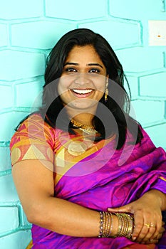 Indian Woman in Purple Saree Smiling