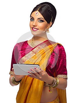 Indian woman with tablet PC isolated