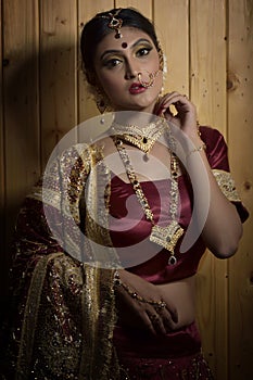 Indian woman with traditional bridal make-up and jewelry