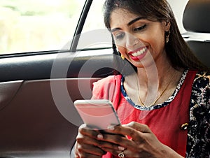 Indian woman using mobile phone