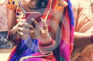 Indian woman using mobile phone