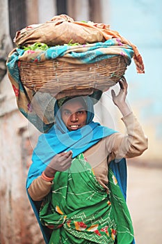 Indian women in national clothes with basket