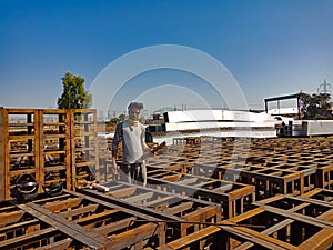 an indian worker making iron structure during railway bridge construction on site in India January 2020